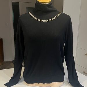 Michael Kors Chic Black Turtleneck Sweater with Gold Chain Accent